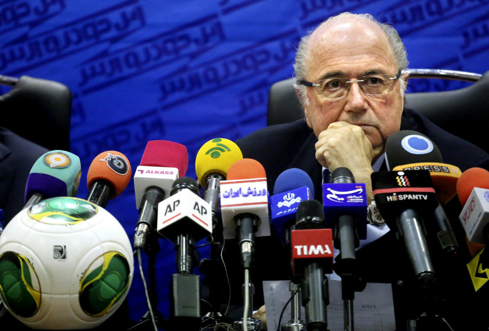 FIFA president Joseph Sepp Blatter listens during a press conference in Tehran, Iran, Thursday, Nov. 7, 2013. Blatter is saying he has urged Iranian authorities to open the gate on female football fans in Iranian stadiums. The Thursday remarks by Blatter came during a briefing in Tehran in which he said he sought Iranian decision makers including parliament speaker Ali Larijani to facilitate presence of female spectators in Iranian stadiums. The controversial issue was in the air in the conservative country over the past decades. (AP Photo/Ebrahim Noroozi)