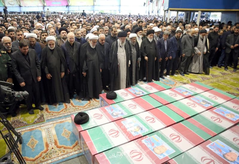 Iran's Supreme Leader Ayatollah Ali Khamenei leads a funeral service for the late President Ebrahim Raisi, the foreign minister and others who died in a helicopter crash.  -/Supreme Leader of Iran Official website/dpa