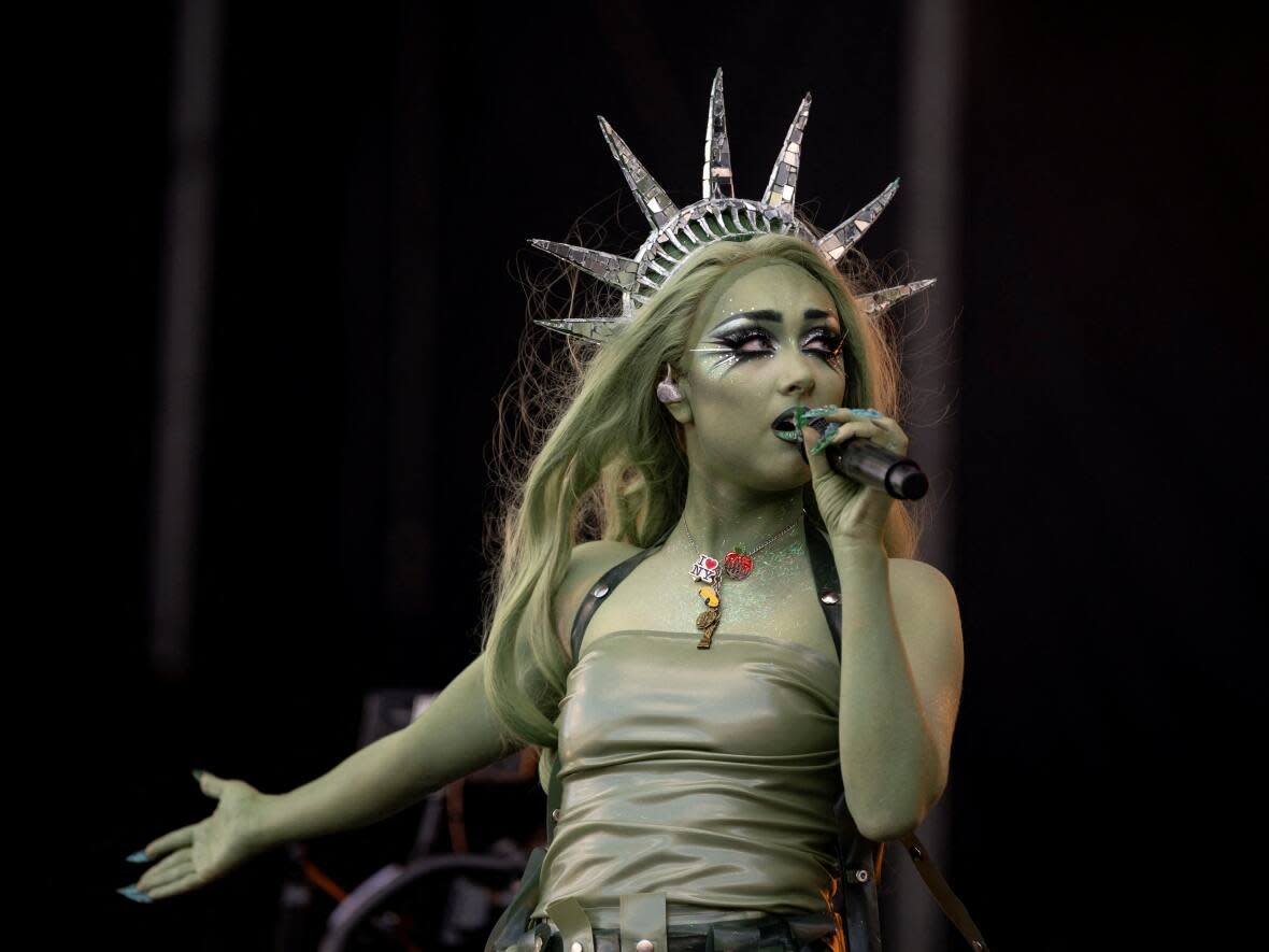 Chappell Roan performs at the Governors Ball music festival at Corona Park in New York City, on Sunday. Roan told the crowd of 150,000 that she turned down an invitation to perform at the White House’s Pride festivities. (Cheney Orr/Reuters - image credit)