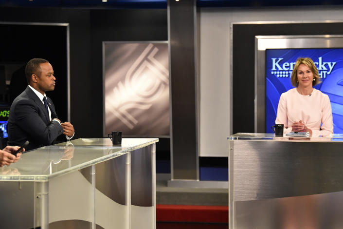 FILE - Kentucky Attorney General Daniel Cameron, left, and Kentucky gubernatorial candidate Kelly Craft prepare for the start of the Kentucky Gubernatorial GOP Primary Debate in Lexington, Ky., May 1, 2023. Kentucky's crowded Republican primary campaign for governor comes to a close on May 16, wrapping up a bitter competition between two rivals with ties to former President Donald Trump who dominated the race. Only one of 12 contenders will remain standing to challenge the red-leaning state's popular Democratic governor.(AP Photo/Timothy D. Easley, File)