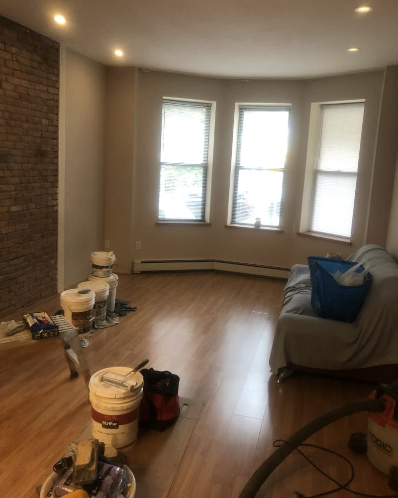 Empty living room with beige walls before decorating