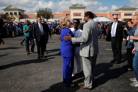 U.S. Democratic presidential nominee Hillary Clinton greets voters outside of an early voting site in Lauderhill, Florida, U.S. November 2, 2016. REUTERS/Brian Snyder