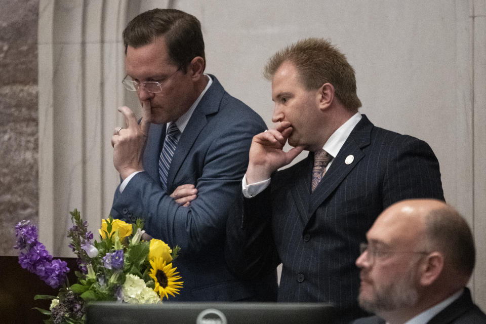 House Speaker Cameron Sexton, left, confers with Rep. William Lamberth during expulsion proceedings for three House Democrats on the floor of the House chamber on Thursday