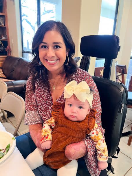 PHOTO: Krystina Pacheco holds her daughter at home after spending over three months hospitalized after giving birth. (Jacob and Krystina Pacheco)