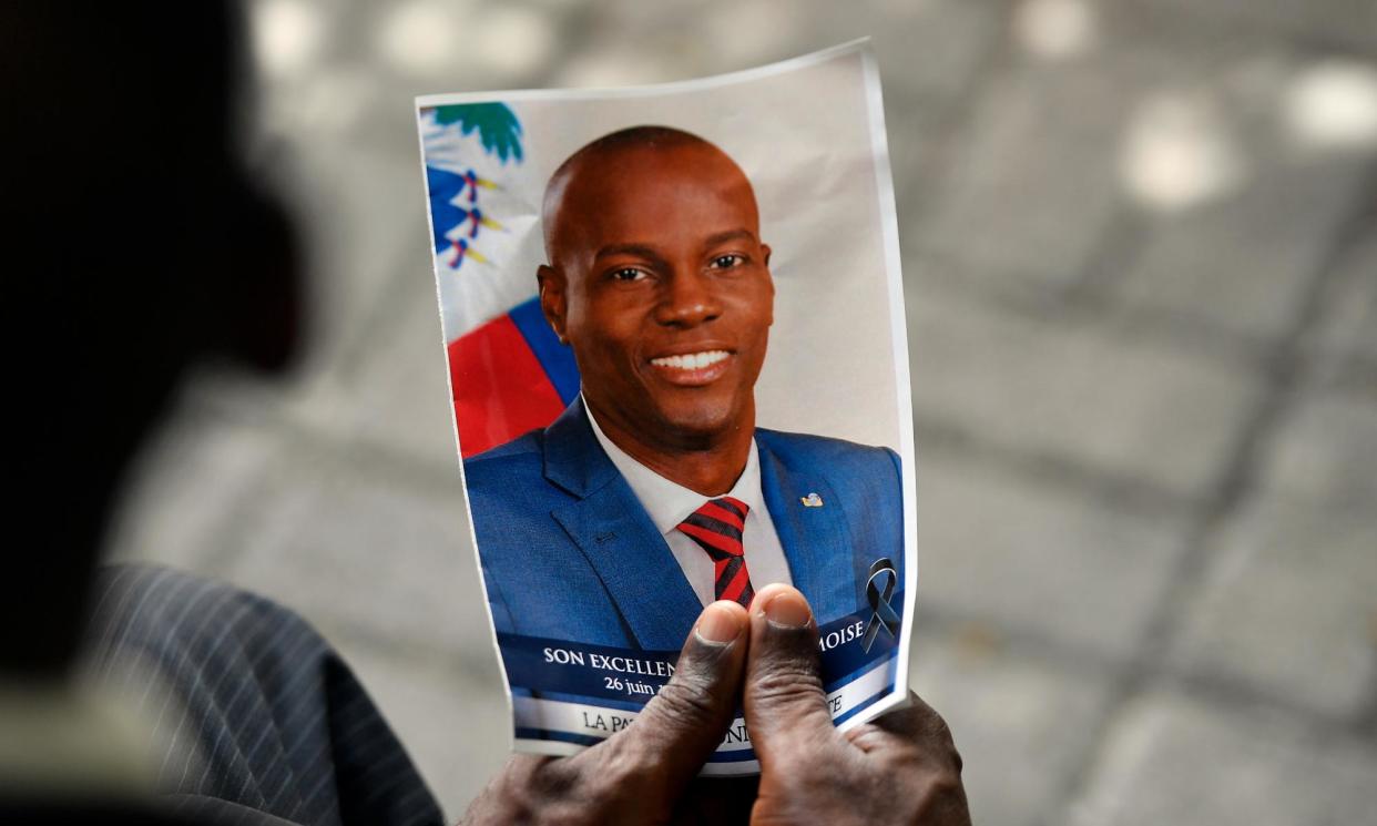 <span>A photo of the late Haitian president Jovenel Moïse during his memorial ceremony in Port-au-Prince, Haiti, on 20 July 2021.</span><span>Photograph: Matias Delacroix/AP</span>