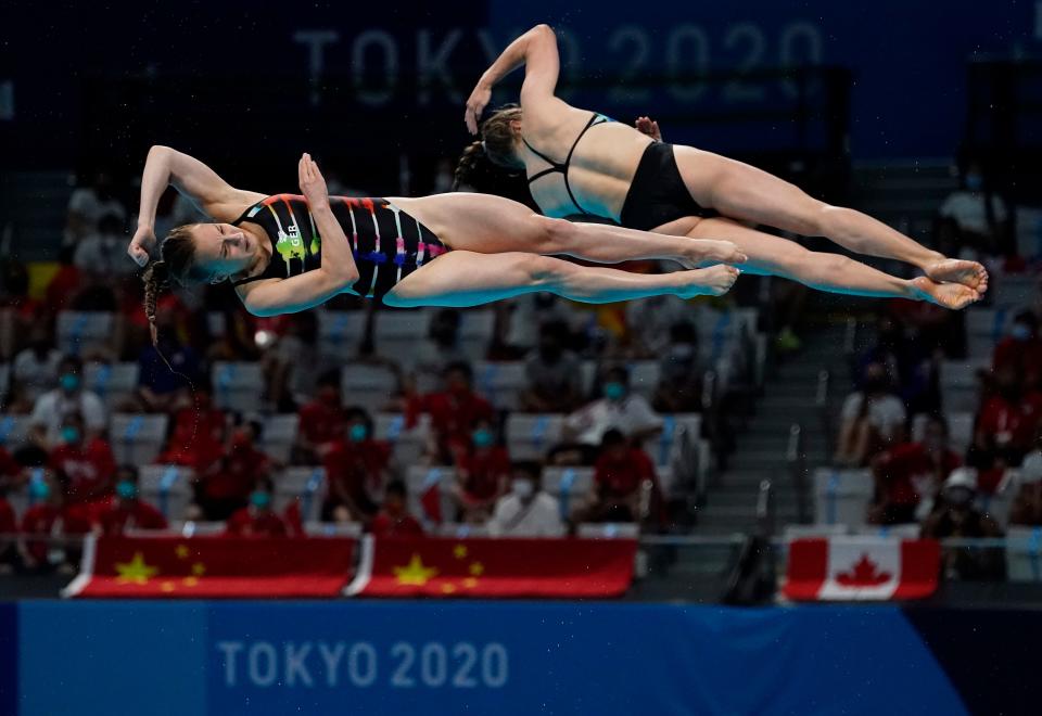 Jul 25, 2021; Tokyo, Japan; Lena Hentschel and Tina Punzel (GER) during the women's synchronized 3m springboard diving competition during the Tokyo 2020 Olympic Summer Games at Tokyo Aquatics Centre. Mandatory Credit: Rob Schumacher-USA TODAY Network
