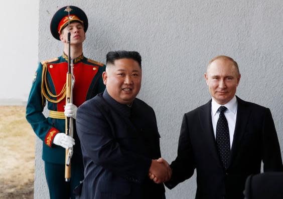 Putin offers help to break North Korea nuclear deadlock in first meeting with Kim Jong-un