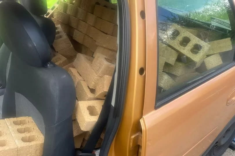 Police found a car with bricks piled up inside -Credit:CMPG