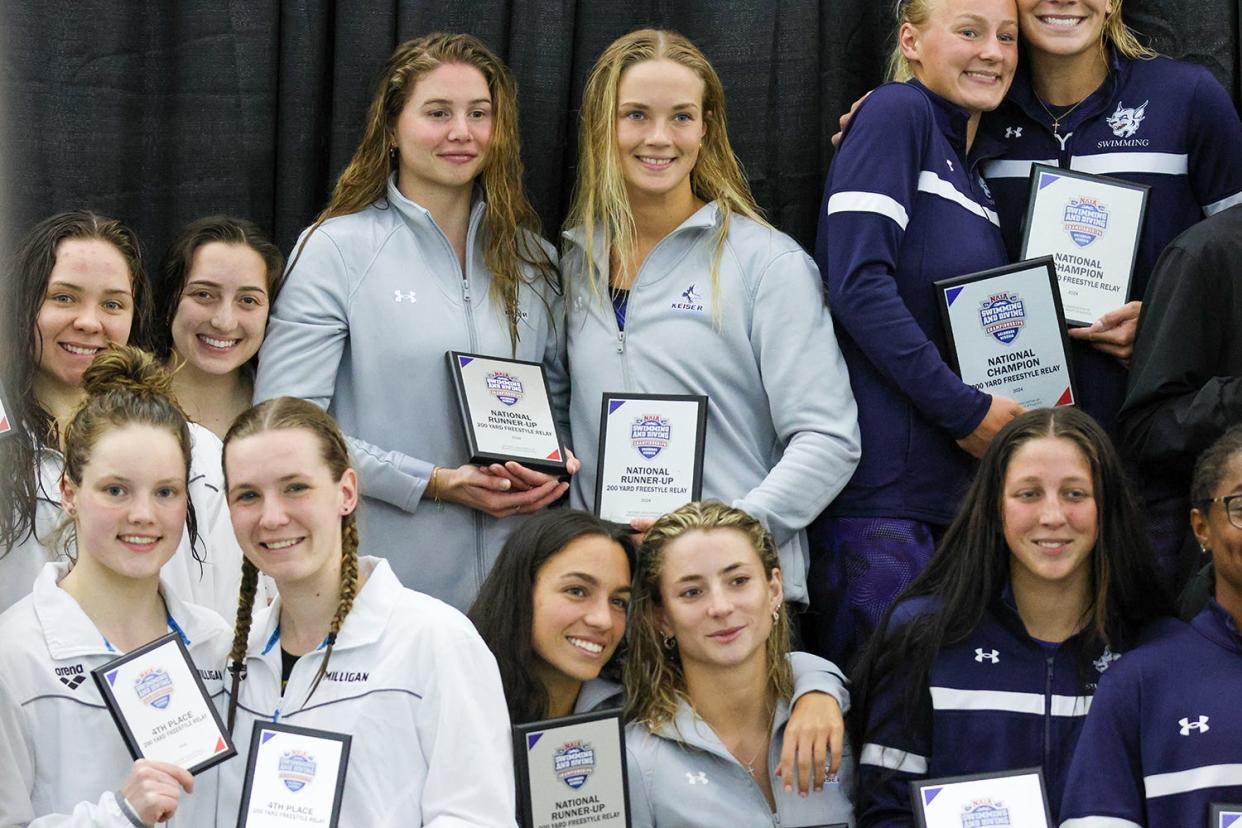 The Keiser Seahawks relay team celebrates a win at the podium at the NAIA national championship in Columbus, Georgia last week.
