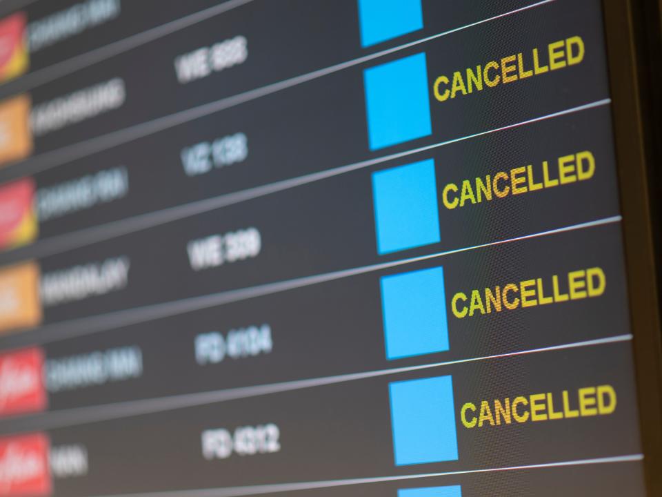 Departure flight board with cancelation at the Airport