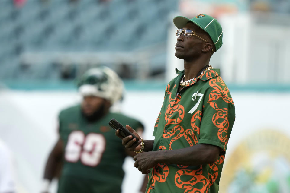 Former NFL player Chad Johnson watches from the Florida A&M sideline during the second half of the Orange Blossom Classic NCAA college football game against Jackson State, Sunday, Sept. 3, 2023, in Miami Gardens, Fla. (AP Photo/Lynne Sladky)