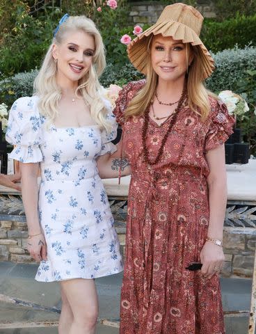 <p>Mark Von Holden/Shutterstock</p> Kelly Osbourne and Kathy Hilton