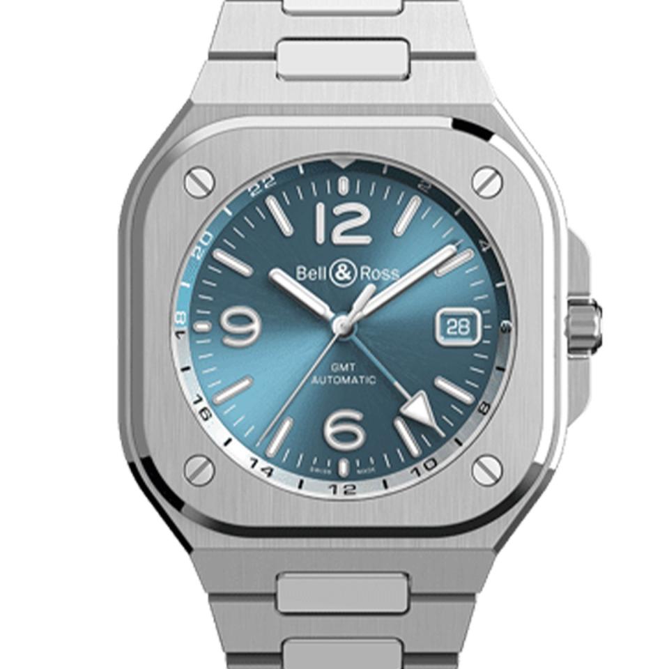 a silver analog watch