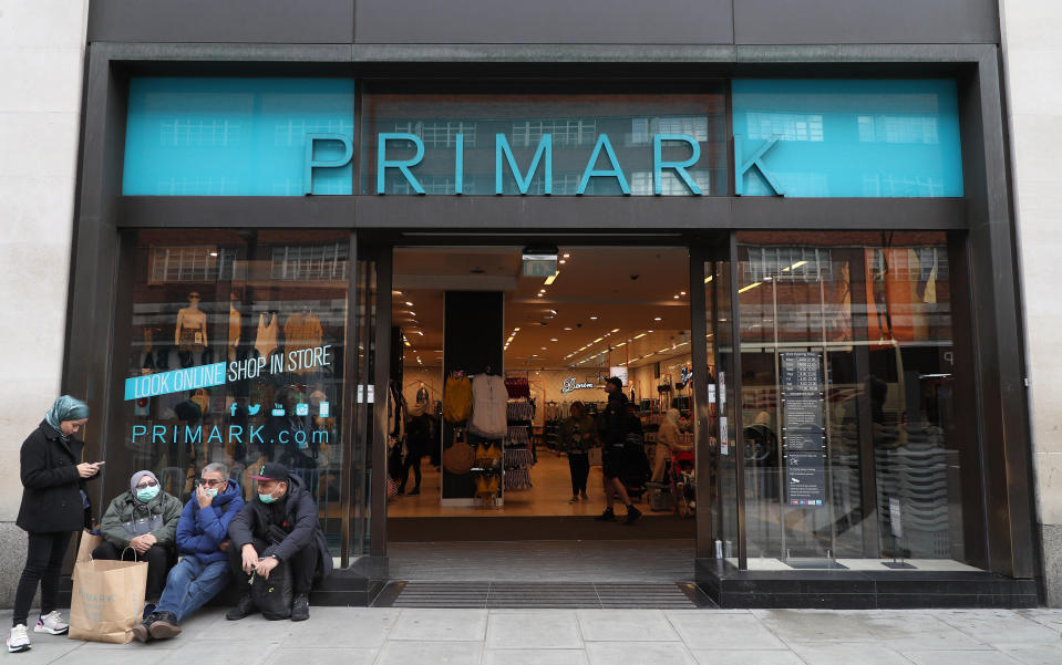 File photo dated 13/3/2020 of people in masks outside a Primark in Oxford Street in London. The owner of budget fashion firm Primark has said 68,000 staff have been furloughed across Europe amid the coronavirus lockdown as it revealed a �248 million hit for unsold stock as all its stores remain shut.