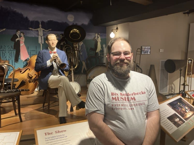 Bix Museum Nate Kraft (standing in front of a model of Bix Beiderbecke at the Indiana resort Hudson Lake in summer 1926) on Wednesday, March 6, 2024 (photo by Jonathan Turner).