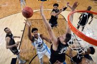 <p>Isaiah Hicks #4 of the North Carolina Tar Heels shooots against Zach Collins #32 of the Gonzaga Bulldogs in the first half during the 2017 NCAA Men’s Final Four National Championship game at University of Phoenix Stadium on April 3, 2017 in Glendale, Arizona. (Photo by Chris Steppig – Pool/NCAA Photos via Getty Images) </p>