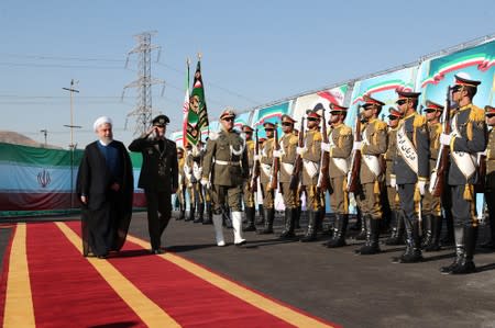 Iranian President Hassan Rouhani attends the unveiling ceremony for the mobile Bavar-373 system in Tehran