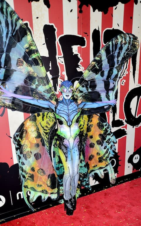 Heidi Klum dressed as a butterfly in 2014 - Credit: Rex