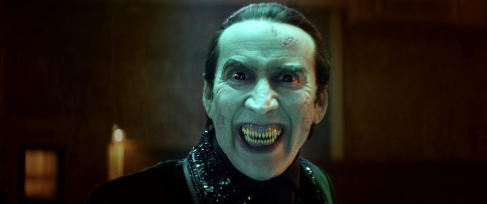 Nicolas Cage as Dracula showing his fangs