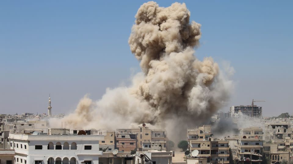 Smoke rises from buildings following a reported air strike on a rebel-held area in the southern Syrian city of Daraa, on June 7, 2017. - Mohamad Abazeed/AFP via Getty Images