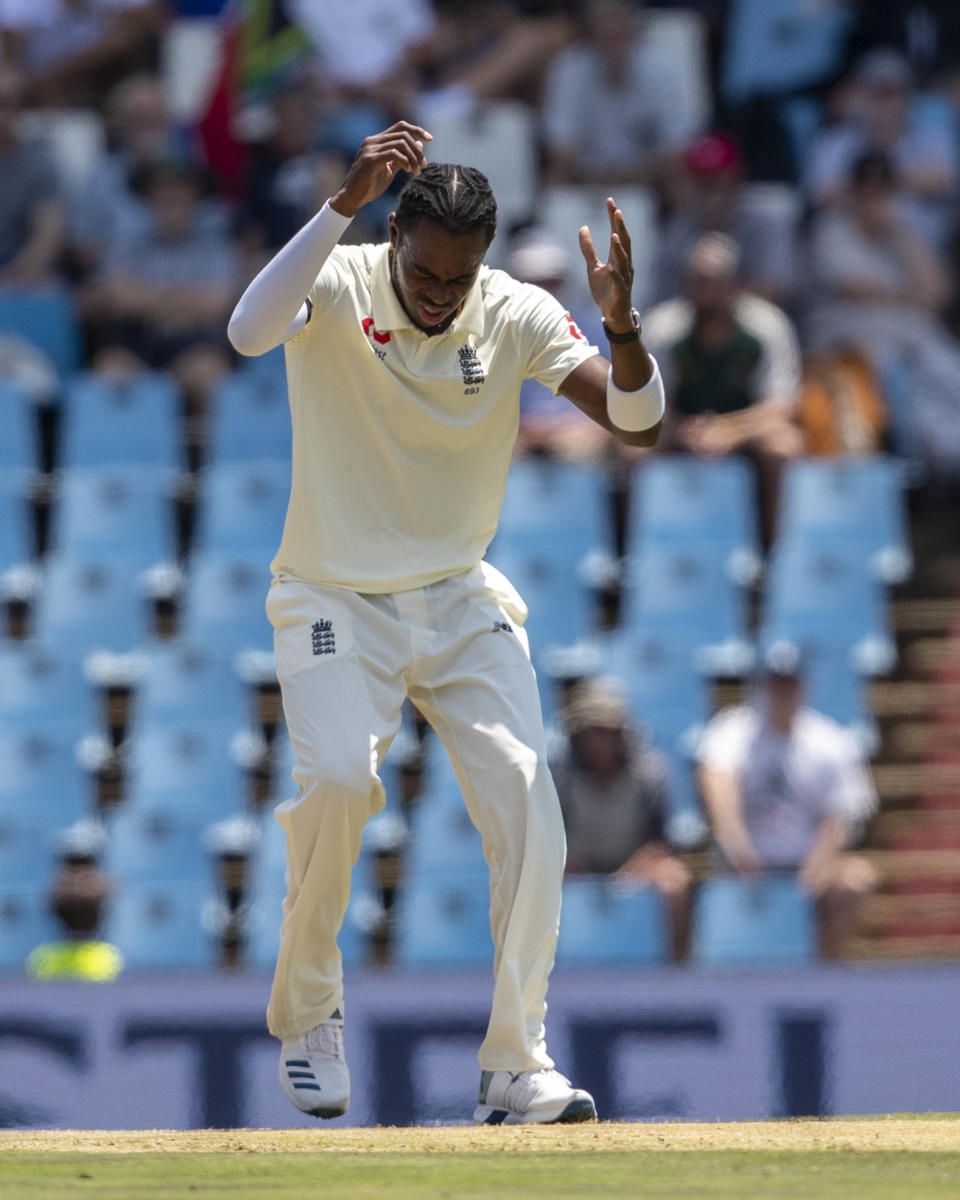England's bowler Jofra Archer reacts after his delivery on day one of the first cricket test match between South Africa and England at Centurion Park, Pretoria, South Africa, Thursday, Dec. 26, 2019. (AP Photo/Themba Hadebe)