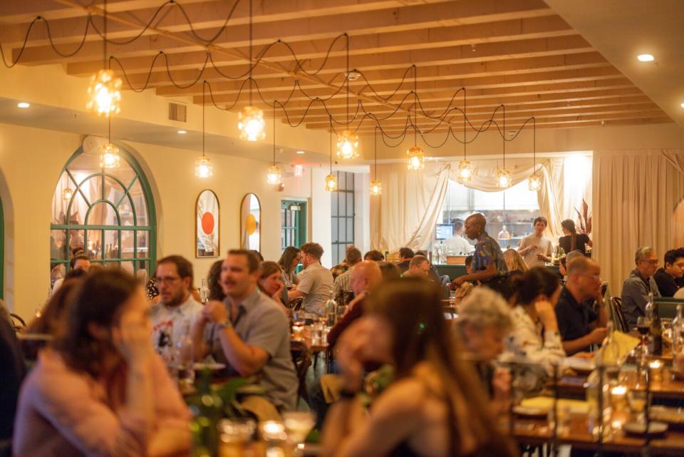 A packed Bar Chelou dining room.