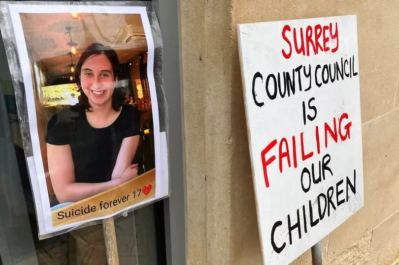 Signs from the protest at Surrey County Council\'s HQ. (Credit: Emily Dalton/LDRS)