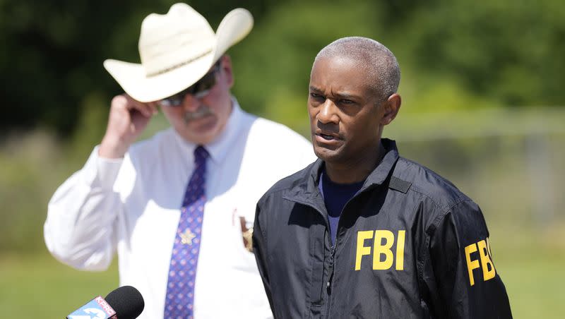 FBI Houston Special Agent in Charge James Smith speaks during a news conference, Sunday, April 30, 2023, in Cleveland, Texas. The search for a Texas man who allegedly shot his neighbors after they asked him to stop firing off rounds in his yard stretched into a second day Sunday, with authorities saying the man could be anywhere by now. The suspect fled after the shooting Friday night that left five people dead, including a young boy. 