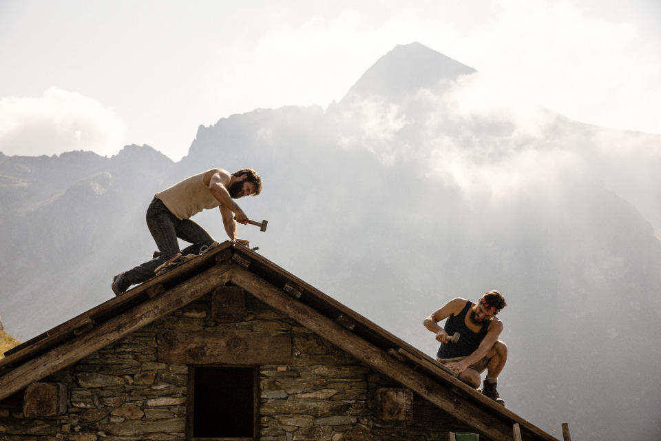 This image released by Sideshow and Janus Films shows Alessandro Borghi, left, and Luca Marinelli in "The Eight Mountains." (Sideshow and Janus Films via AP)