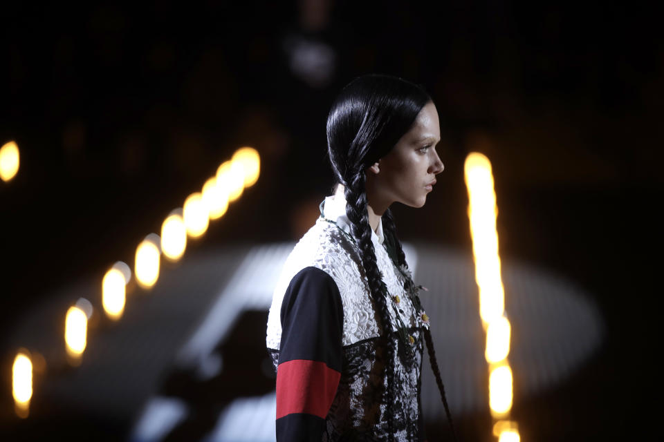 A model wears a creation as part of the Prada women's Fall-Winter 2019-2020 collection, that was presented in Milan, Italy, Thursday, Feb.21, 2019. (AP Photo/Luca Bruno)