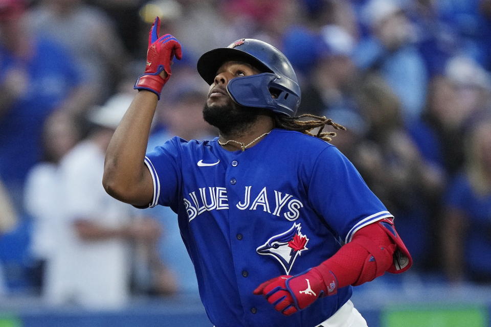 Toronto Blue Jays' Vladimir Guerrero Jr. celebrates his solo home run against the Tampa Bay Rays during the first inning of a baseball game Wednesday, Sept. 14, 2022, in Toronto. (Frank Gunn/The Canadian Press via AP)