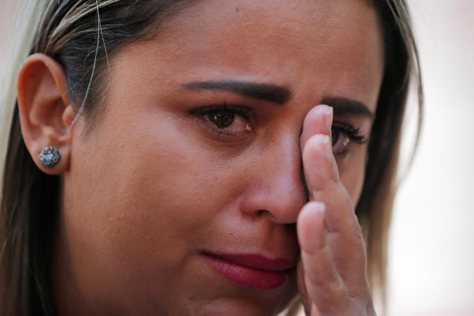 <p>Sirley Paixao, whose ten-year-old son Diego was separated from her by U.S. immigration officials on May 24, 2018, cries while talking to reporters before the “Families Belong Together” rally in Boston, Mass., June 30, 2018 (Photo: Brian Snyder/Reuters) </p>