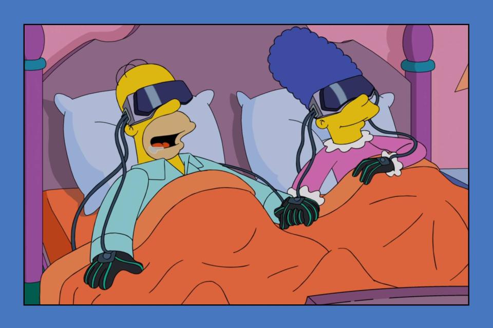 <p>Fox/Disney+</p>  Homer and Marge laying in bed with virtual reality glasses in the season 28 episode 