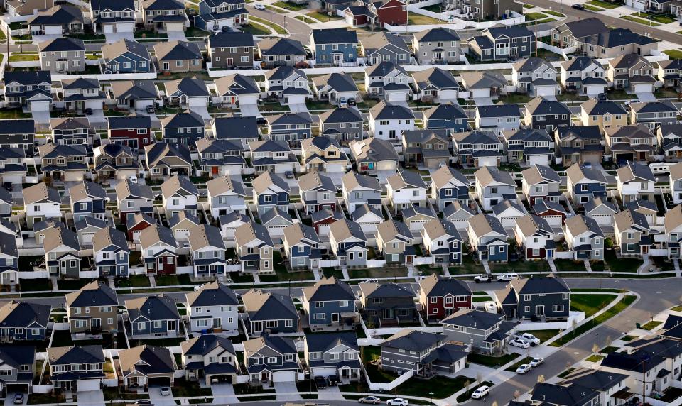 This April 13, 2019, file photo, shows rows of homes, in suburban Salt Lake City.