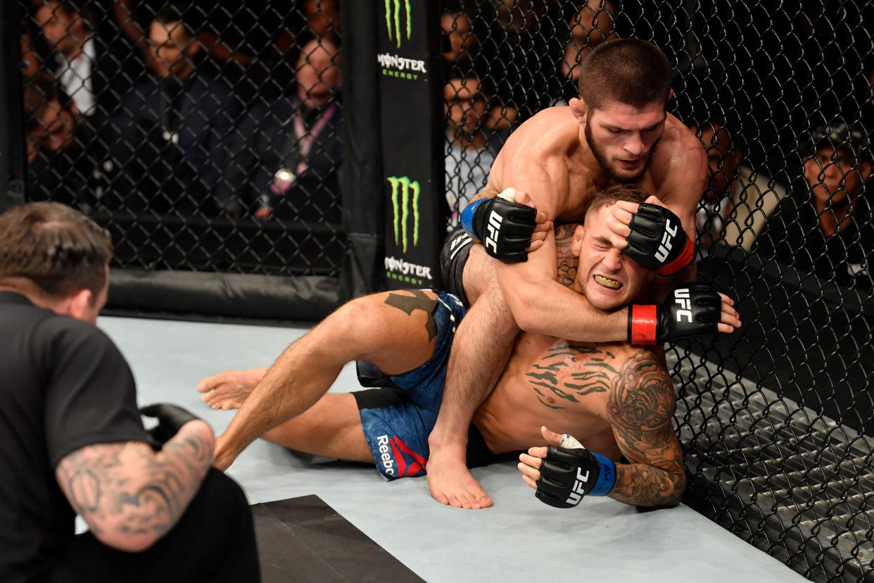 ABU DHABI, UNITED ARAB EMIRATES - SEPTEMBER 07:  Khabib Nurmagomedov of Russia (top) attempts to submit Dustin Poirier in their lightweight championship bout during UFC 242 at The Arena on September 7, 2019 in Yas Island, Abu Dhabi, United Arab Emirates. (Photo by Jeff Bottari/Zuffa LLC/Zuffa LLC via Getty Images)