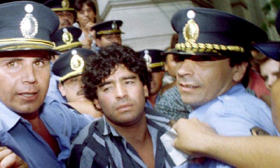 Maradona leaves a courthouse in March 1994 after answering charges of shooting and injuring journalists outside his country home in Mercedes, 100km from Buenos Aires