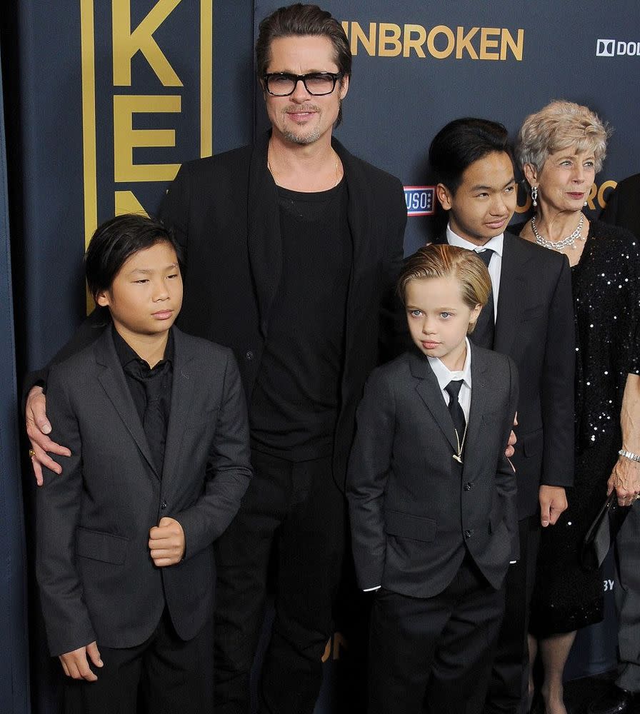 Brad Pitt with three of his six children | Gregg DeGuire/WireImage