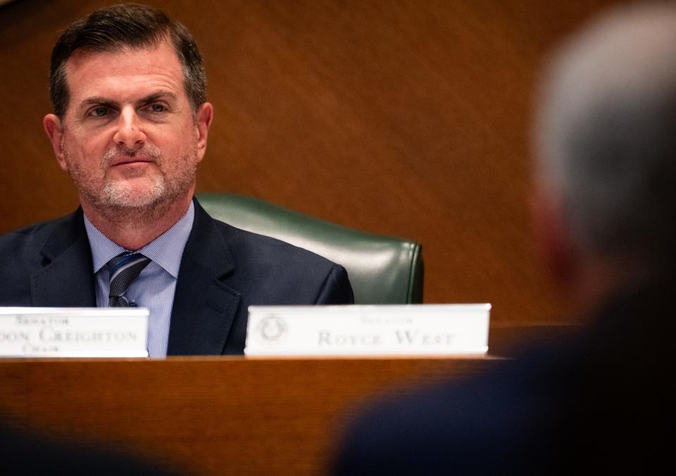 Sen. Brandon Creighton, R-Conroe, the author of Senate Bill 17, listens to UT System Chancellor J.B. Milliken during Tuesday's hearing.