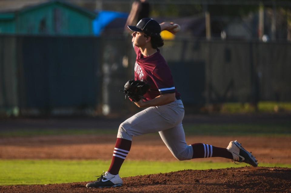 Dwyer pitcher Nick Rovitti delivers a pitch at the bottom of the first inning during the varsity baseball game between host Jupiter and Dwyer in Jupiter, FL., on Monday, March 28, 2022. Final score, Jupiter, 3, Dwyer, 1.