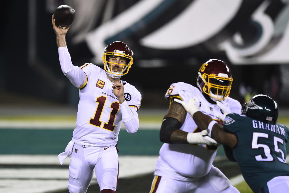 Washington Football Team's Alex Smith plays during the first half of an NFL football game against the Philadelphia Eagles, Sunday, Jan. 3, 2021, in Philadelphia. (AP Photo/Derik Hamilton)