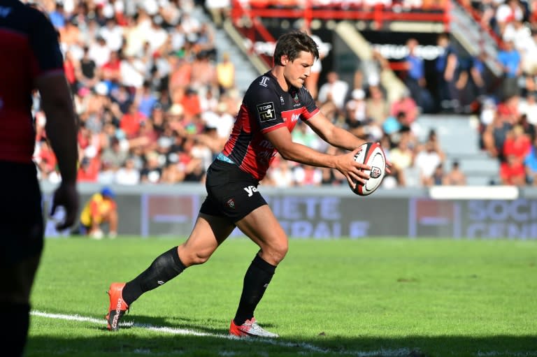 Toulon's fly-half Francois Trinh Duc kicks the ball on September 11, 2016