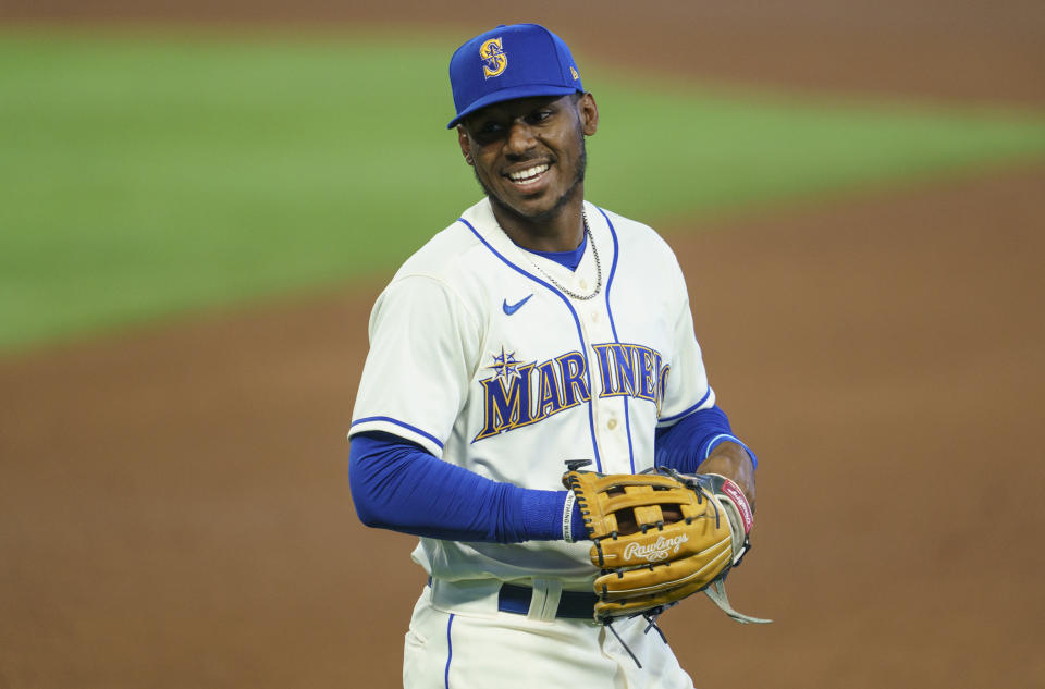 Kyle Lewis ranks second in the AL in batting average and has a better WAR than Mike Trout. (Photo by Stephen Brashear/Getty Images)