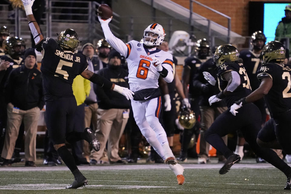 FILE - Syracuse quarterback Garrett Shrader (6) looks to pass against Wake Forest during the first half of an NCAA college football game in Winston-Salem, N.C., Saturday, Nov. 19, 2022. Syracuse opens their season at home against Colgate on Sept. 2. (AP Photo/Chuck Burton)