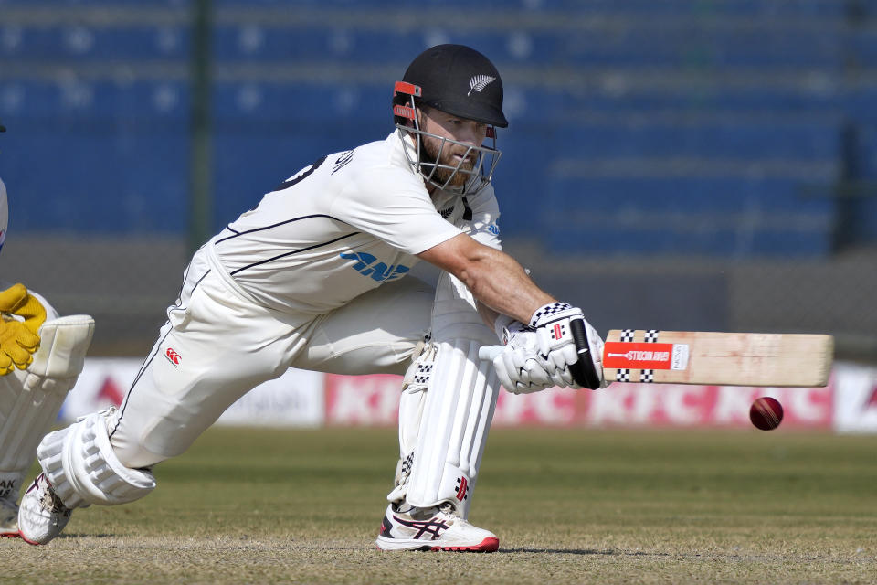 New Zealand's Kane Williamson plays a reverse sweep shot during the fourth day of first test cricket match between Pakistan and New Zealand, in Karachi, Pakistan, Thursday, Dec. 29, 2022. (AP Photo/Fareed Khan)