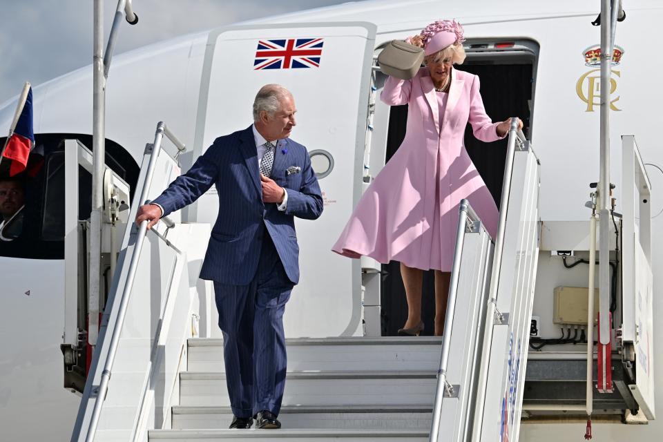 The King and Queen arrived in Paris at 2pm French time (via REUTERS)