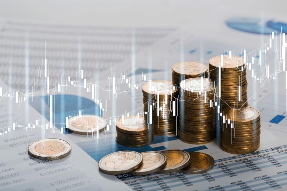 Graphic of coins in stacks to represent fundraising money