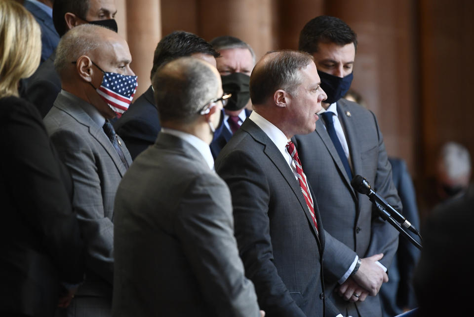 Assemblyman Minority Leader William A. Barclay, R- Fulton, second from right, stands with Assembly Republicans calling for the impeachment of New York Gov. Andrew Cuomo during a news conference at the state Capitol, Monday, March 8, 2021, in Albany, N.Y. (AP Photo/Hans Pennink)