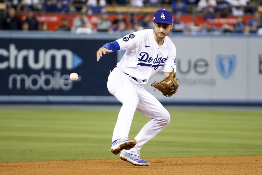 Los Angeles, CA - October 12: Los Angeles Dodgers shortstop Trea Turner makes an error.