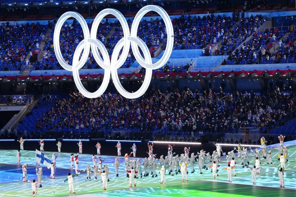 Valtteri Filppula leads Finland's team during the opening ceremony of the 2022 Winter Olympics, Friday, Feb. 4, 2022, in Beijing. (AP Photo/Petr David Josek)