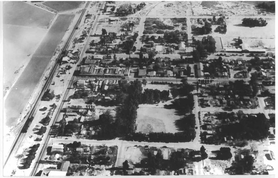 An aerial view of the city of Coachella in its early years. The empty lot at the center is present-day Veterans Park.